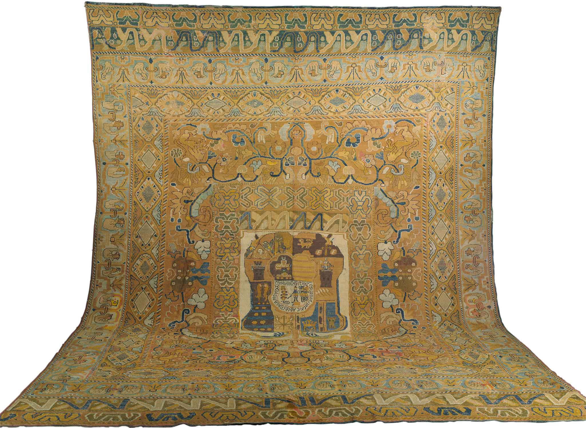 An early 17th century Portuguese Armourial Carpet from the Doris Duke Collection. Sized approximately 19'5" x 14'10". Sold at auction by Christie's for $80,500 (USD) including premium.