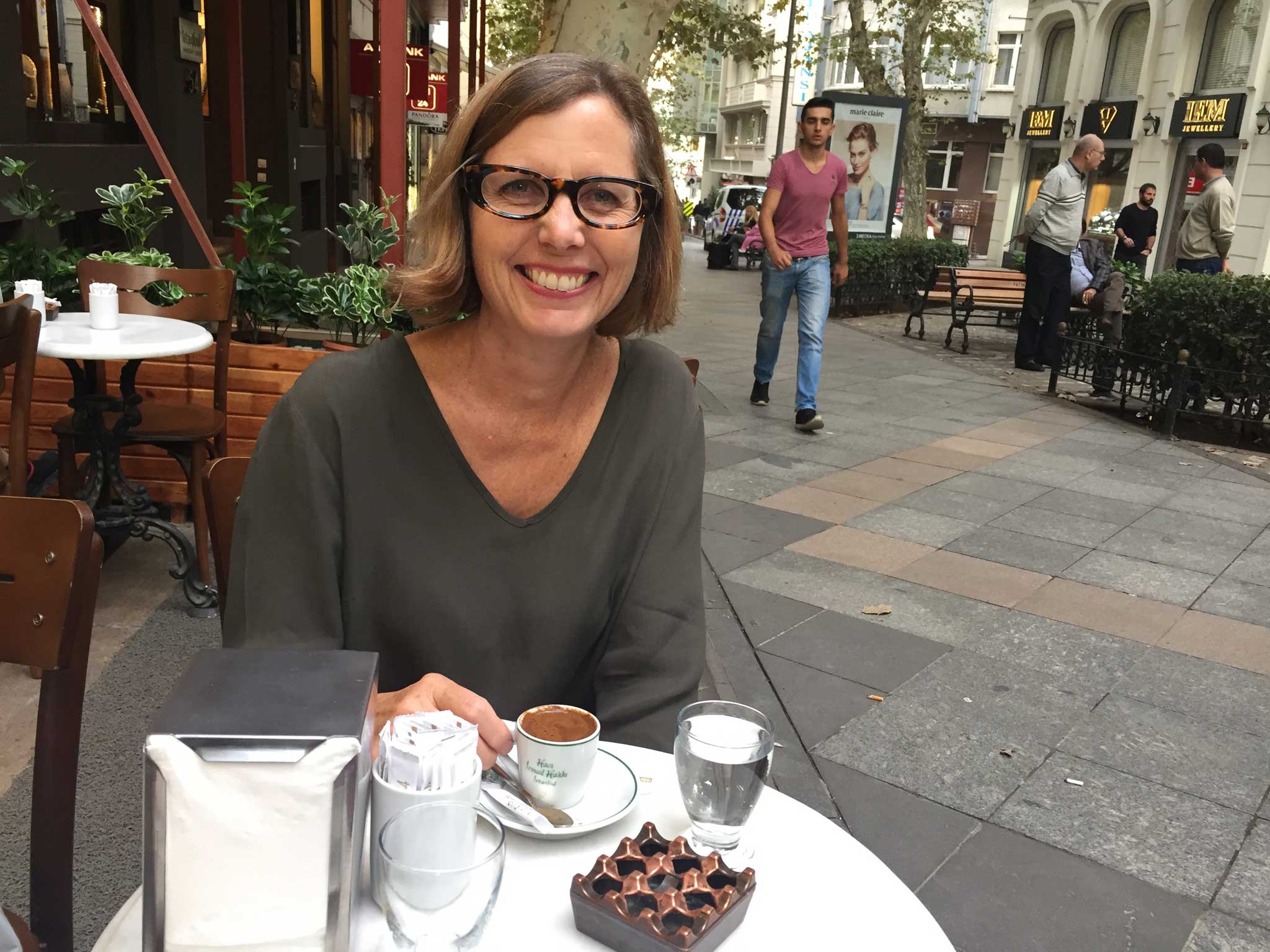 Carol Sebert, President of Creative Matters enjoys a cup of Turkish Coffee during the Inaugural Istanbul Carpet Week. Carol presented 'Contemporary Carpet Design' at the Istanbul International Carpet Conference, 6 October 2016. | Image courtesy of The Ruggist.