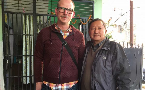 Michael Christie, The Ruggist (left) shown with Gopal Thapa Magar, Director of CWARDS a daycare for children of weavers run jointly between CWARDS and GoodWeave. | Image courtesy of The Ruggist.