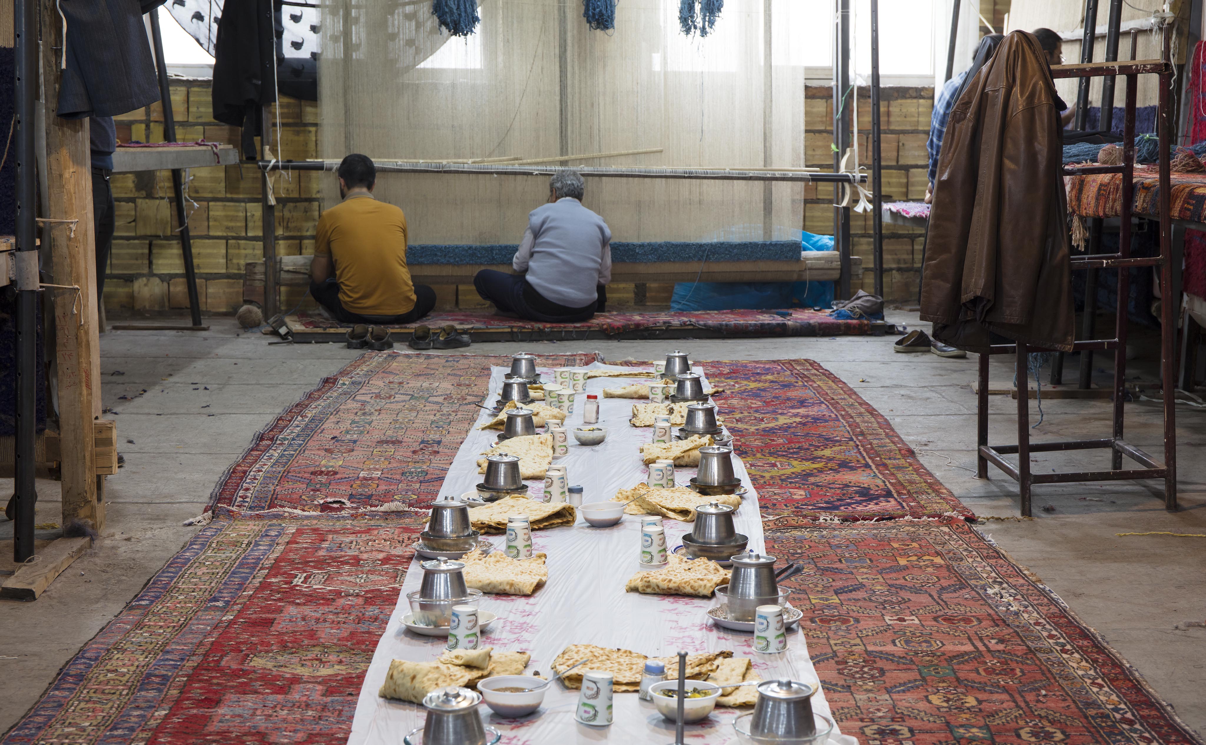 As tradition dictates, before the first carpet of the 'Silence Azerbaijan Collection' could be loomed a feast was prepared. | Image courtesy of Nasser Nishaburi.
