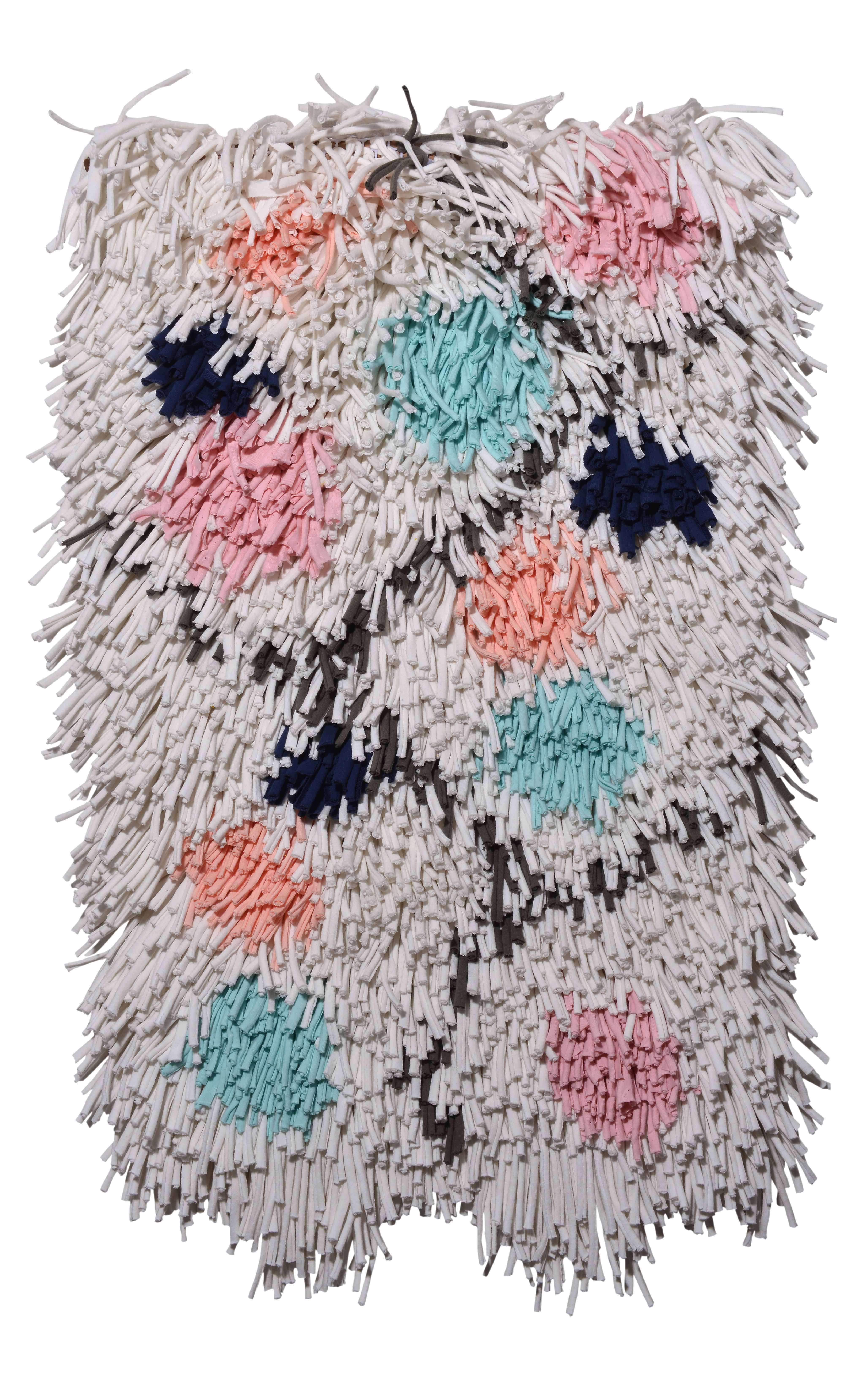 'Wish Balls' throw rug by Ragmate is made using the same repurposed fabric texture as the original Ragamuf chair cover. | Image courtesy of Ragmate.