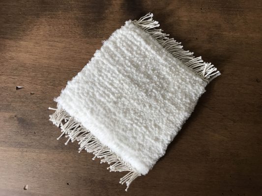 On 13 December 2018, Shally Sarawagi of Sarawagi Rugs in Kathmandu, Nepal presented Michael Christie with a diminutive handknotted carpet sample made of ECONYL® regenerated nylon. | Photograph by The Ruggist.