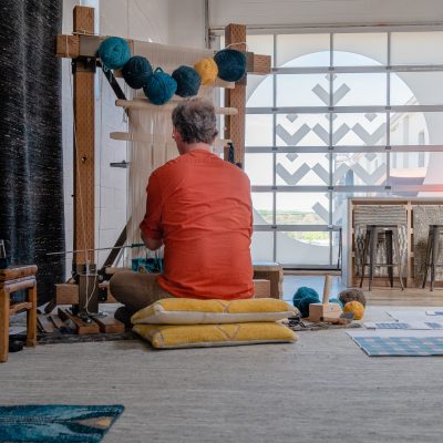 Having learnt to weave during the depths of the COVID-19 pandemic, Michael Christie, The Ruggist, debuted his first weaving demonstration at the request of Ryan Higgins of Tamarian Carpets for the firm's inaugural 'Present Company' in May 2022. | Photograph courtesy of Tamarian Carpets, 10 May 2022